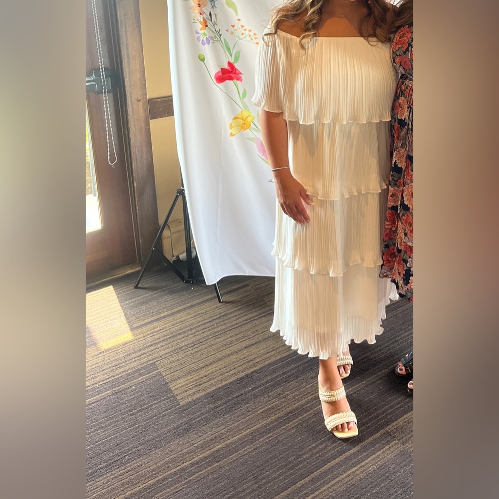 Off shoulder, tiered pleated white dress
